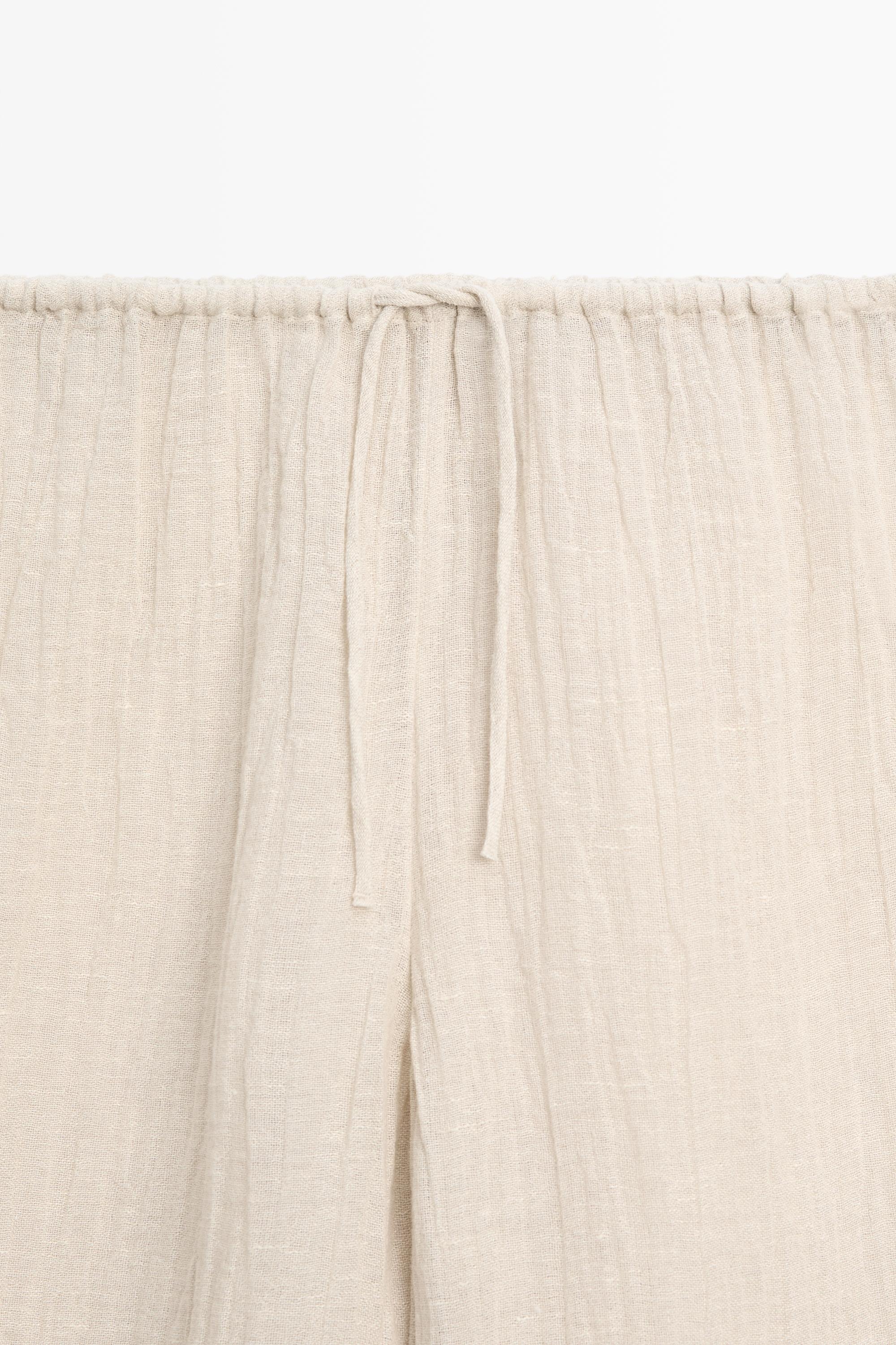 Total look flowing waffle-knit linen blend trousers